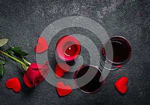 Valentines day greeting background. Wine glasses, rose and candl
