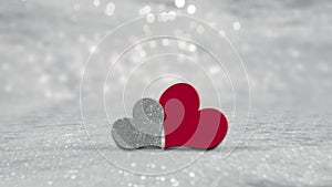 Valentines Day hearts on silver background