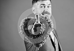 Valentines day holiday. Love. Wedding day. stylish esthete with decorative heart. bearded man in formal suit