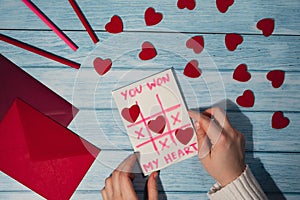 Valentines Day. Instructions for making valentine cards. Text YOU WON MY HEART and tic tac toe game Postcard craft