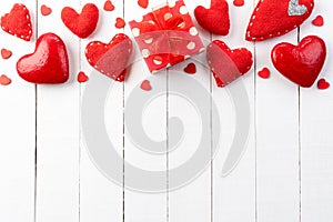 Valentines day and love concept. handmade red hearts with red gift box