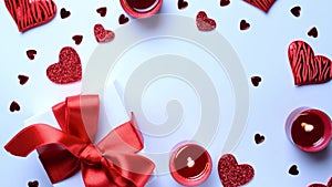 Valentines day minimal: red love hearts, romantic gift box, candle on white background. Sainte Valentine, mothers day, birthday gr