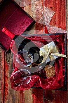Valentines day. Red wine bottle and glasses in a box