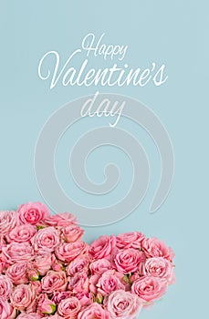 Valentines day romantic greeting card. Composition with a heart of pink roses on a blue background.Mothers day. 8 Marth. Banner