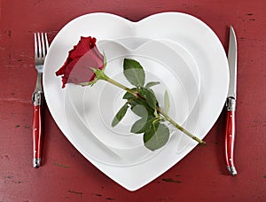 Valentines Day table place setting with red rose