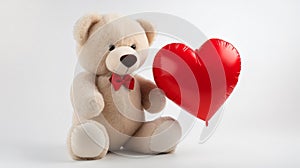 Valentines day teddy bear wearing a red bow on white background