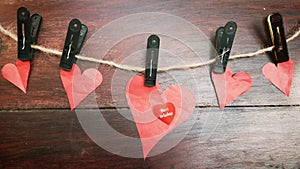 Valentines day. Valentines background with clipped red paper hearts on wood planks. Happy lovers day. valentines day concept