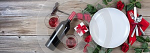 Valentines Dinner with Red Wine on rustic wooden background