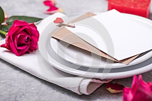 Valentines dinner with table place setting  hearts decoration, rose for valentines days dinner. View from above