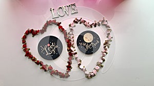 Valentines' love, two rose shaped hearts with I LOVE yOU to the moon & back
