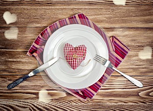 Valentines romantic dinner concept. Holiday meal served heart sh