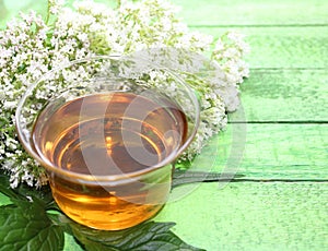 Valerian tea on green boards