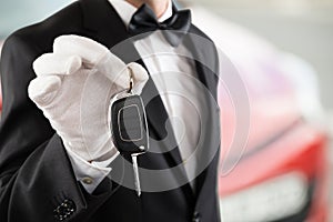 Valet Boy Holding A Car Key