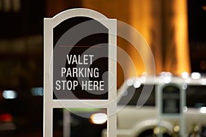 Valet parking - stop here sign