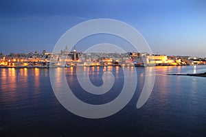 Valetta and Marsamxett Harbour at sundown. Malta