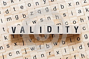 Validity word concept on cubes photo