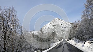 Valldal side of Trollstigen road in snow in Norway