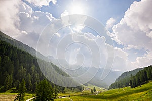 Valle d'Aosta, Italy: meadows, woodland and mountain range