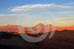 Valle de la Luna, valley of the moon, Volcan Lincancabur in the background, Atacama desert Chile