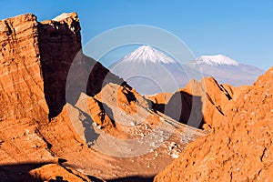 Valle De La Luna, Volcanoes Licancabur and Juriques, Atacama photo