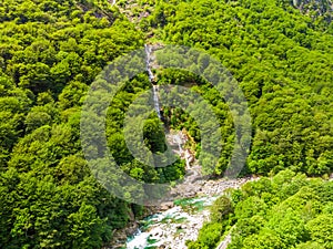 Valle Verzasca - Aerial View of clear and turquoise water stream and rocks in Verzasca River in Ticino - Verzasca Valley in Tessin