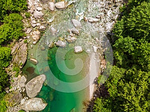 Valle Verzasca - Aerial View of clear and turquoise water stream and rocks in Verzasca River in Ticino - Verzasca Valley in Tessin