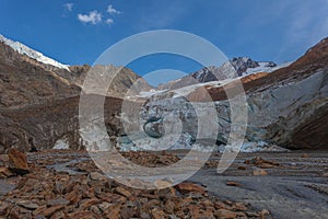 Vallelunga Glacier collapsing front with crevasses and ice caves, Italy