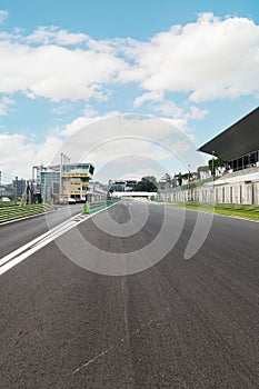 Motor sport circuit asphalt track starting line checkered sign front view