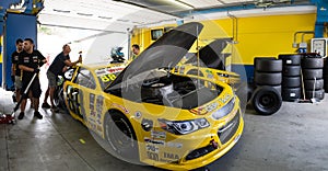 American festival of Rome. Euronascar FJ 2020 yellow car in box with mechanics working