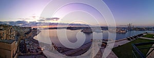 Valletta Grand Harbour with three cities at purple sunrise panorama, Malta