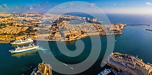 Valletta, Malta - Aerial panoramic skyline view of the Grand Harbour of Malta with cruise ships photo