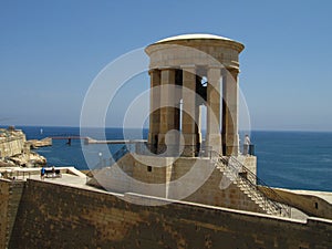 VALLETTA, MALTA - Jul 14, 2013: The Siege Bell memorial, located in Valletta, at the entrance of the Grand Harbour