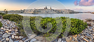 Valletta, Malta - Panoramic skyline view of the ancient city of Valletta with St.Pau`s Cathedral