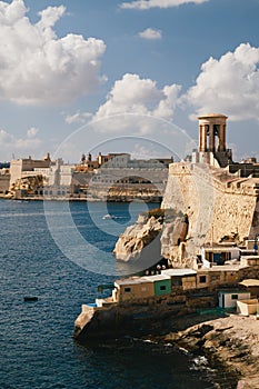 VALLETTA, MALTA - SEPTEMBER, 15 2018: View of the Grand Harbour of Valletta and the Siege Bell War Memorial