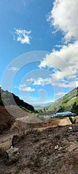 A valley of Barisan Hill under the blue sky