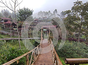 Valley and Bukit Sibajag Green Canyon Temanggung is a recreation in the wild with a path of bamboo