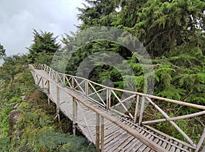 Valley and Bukit Sibajag Green Canyon Temanggung is a recreation in the wild with a path of bamboo