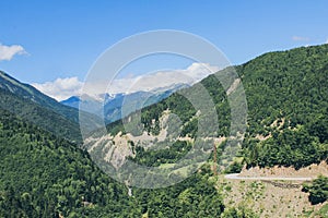 Valley in caucasus mountain with dangerous road