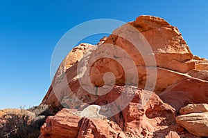 Valley of Fire - Close up view of red Aztek sandstone rock formations in Petroglyph Canyon along Mouse Tank hiking trail, Nevada