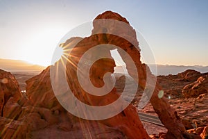 Valley of Fire - Panoramic sunrise view of the elephant rock surrounded by red and orange Aztec Sandstone Rock formations, Nevada