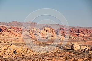 Valley of Fire - Panoramic view of endless winding empty Mouse tank road through canyons of red Aztec Sandstone Rock