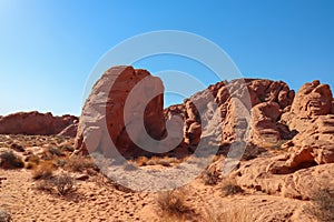Valley of Fire - Panoramic view of red Aztek sandstone rock formations in Petroglyph Canyon along Mouse Tank hiking trail, Nevada