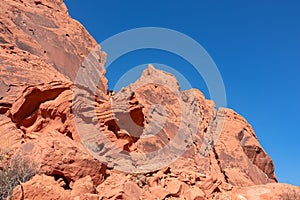 Valley of Fire - Panoramic view of red Aztek sandstone rock formations in Petroglyph Canyon along Mouse Tank hiking trail, Nevada