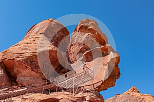 Valley of Fire - Scenic view of staircase of Atlatl rock showing the ancient Indian petroglyphs carvings of the Anasazi, Nevada.