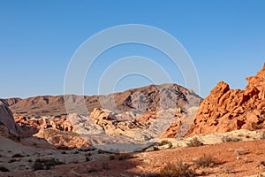 Valley of Fire - Scenic view of striated red and white Aztek sandstone rock formations, Nevada, USA.