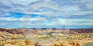 Valley of fire state park, Nevada USA. Red sandstone formations, blue sky with clouds