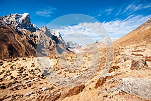 Valley leading to the Everest base camp with Tawoche / Taboche peak. Trekking in Nepal Himalayas. EBC Everest base camp trek