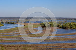 Valley and meanders of Desna river. Overflooded flood plain forest in spring, Ukraine.