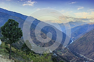 Valley with mountain range in the backgorund Bhutan