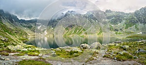 A valley in the mountains with the Hincovo pleso pond in the High Tatras